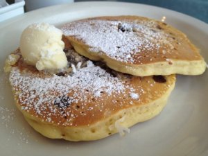 Mouthwatering Almond Joy pancakes at Butter Cafe.
